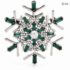 Elegant Green and Silver Snowflake Brooch